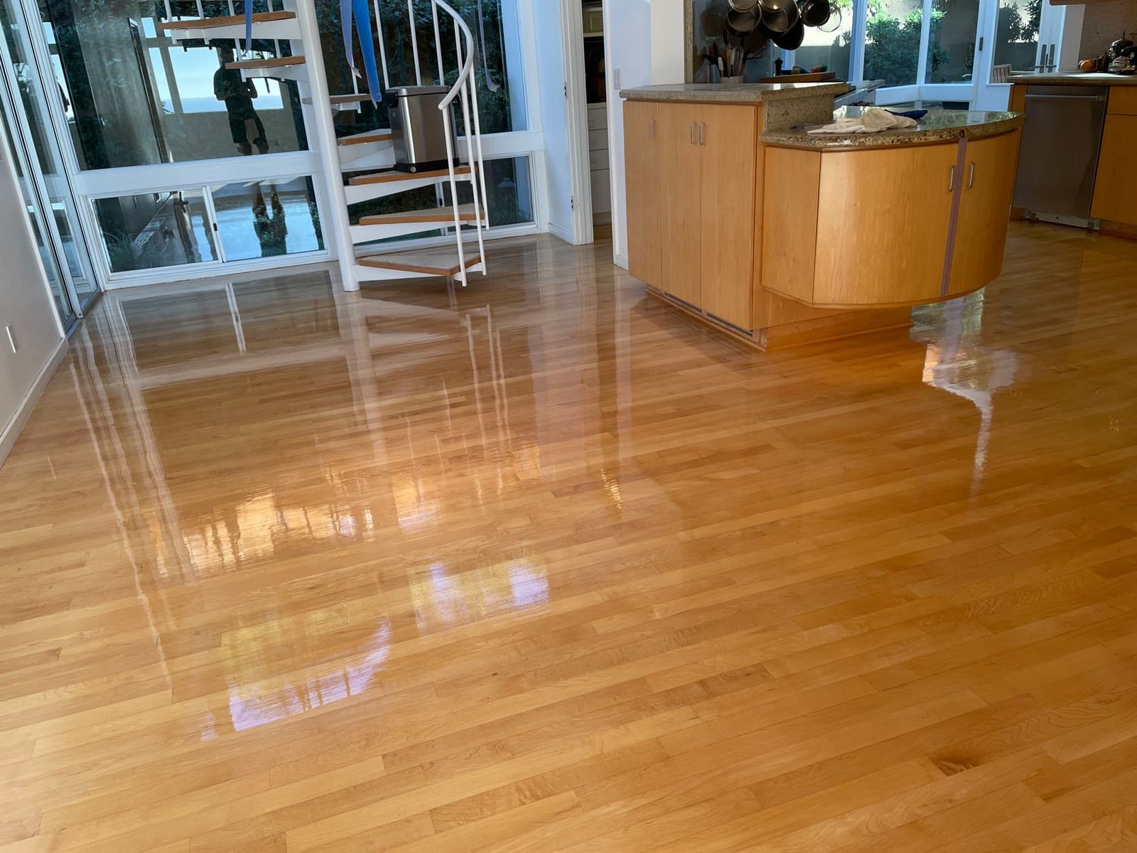 Refinished maple floor with a high-gloss finish in a Del Mar kitchen